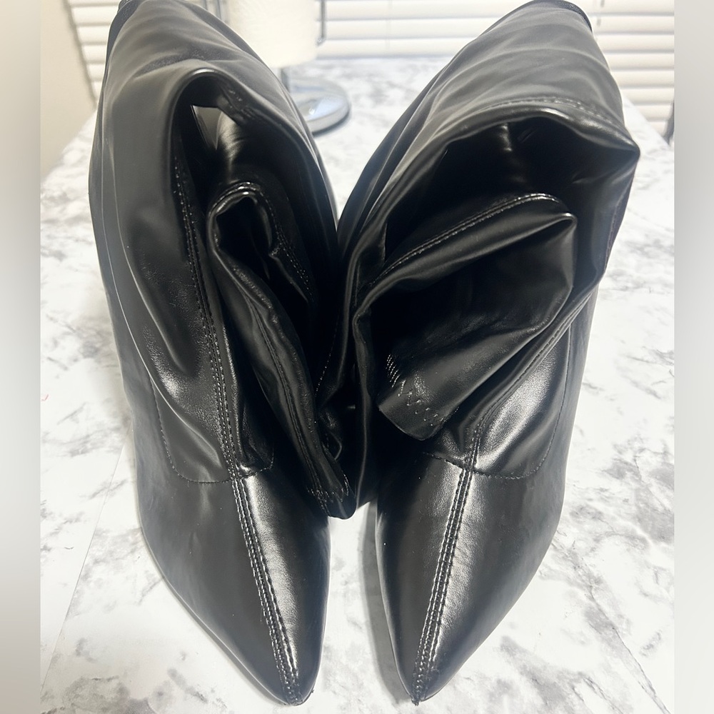 Thigh high heel boots
